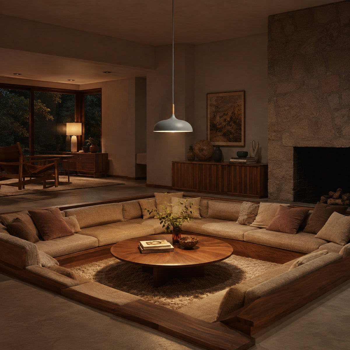 Cobres pendant in mid warm grey with a turned wood cap, the wide shallow Flat Sphere shade, shown in a room