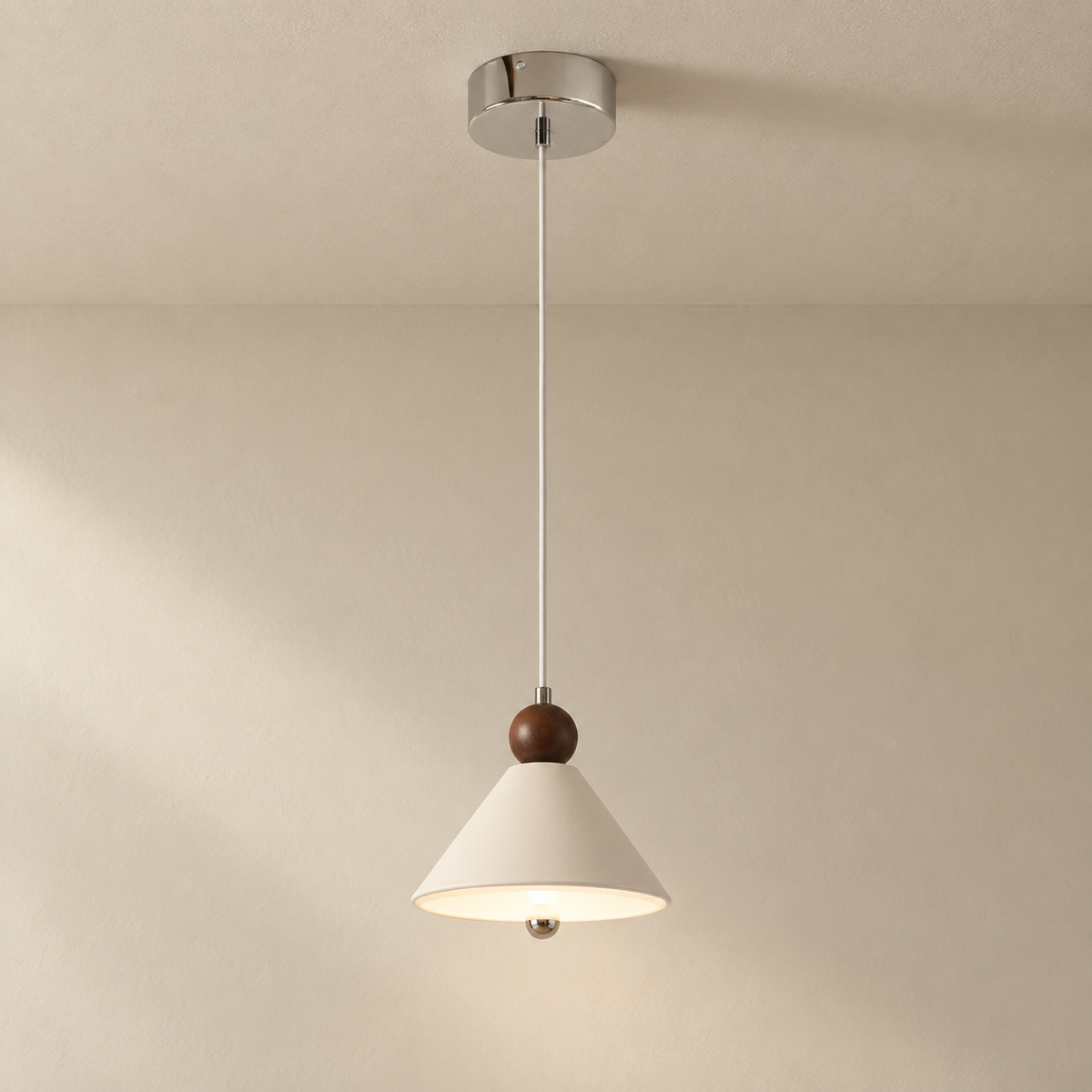 Covilhã cone pendant light, on a plain ceiling.