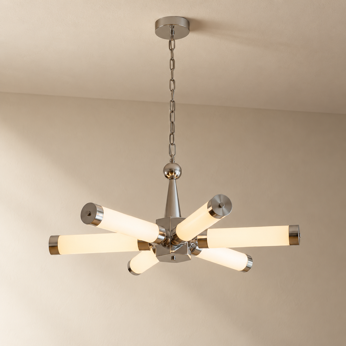 Douro cylindrical starburst ceiling light in chrome, on a plain ceiling.
