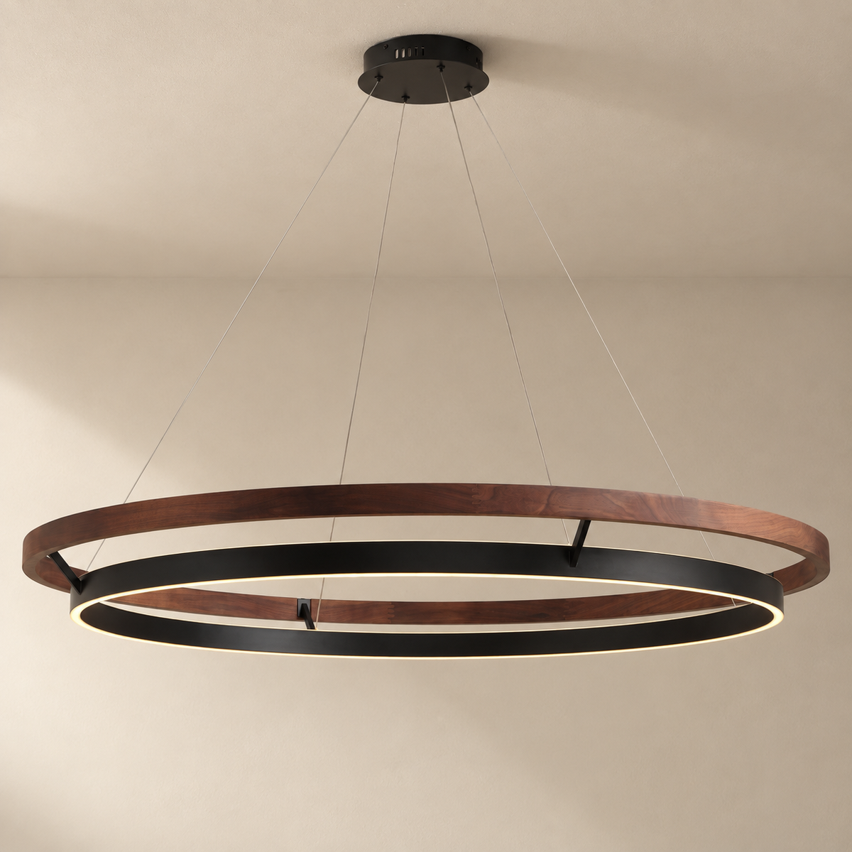Espargos circular LED ceiling light in walnut, 120 cm diameter, on a plain ceiling.
