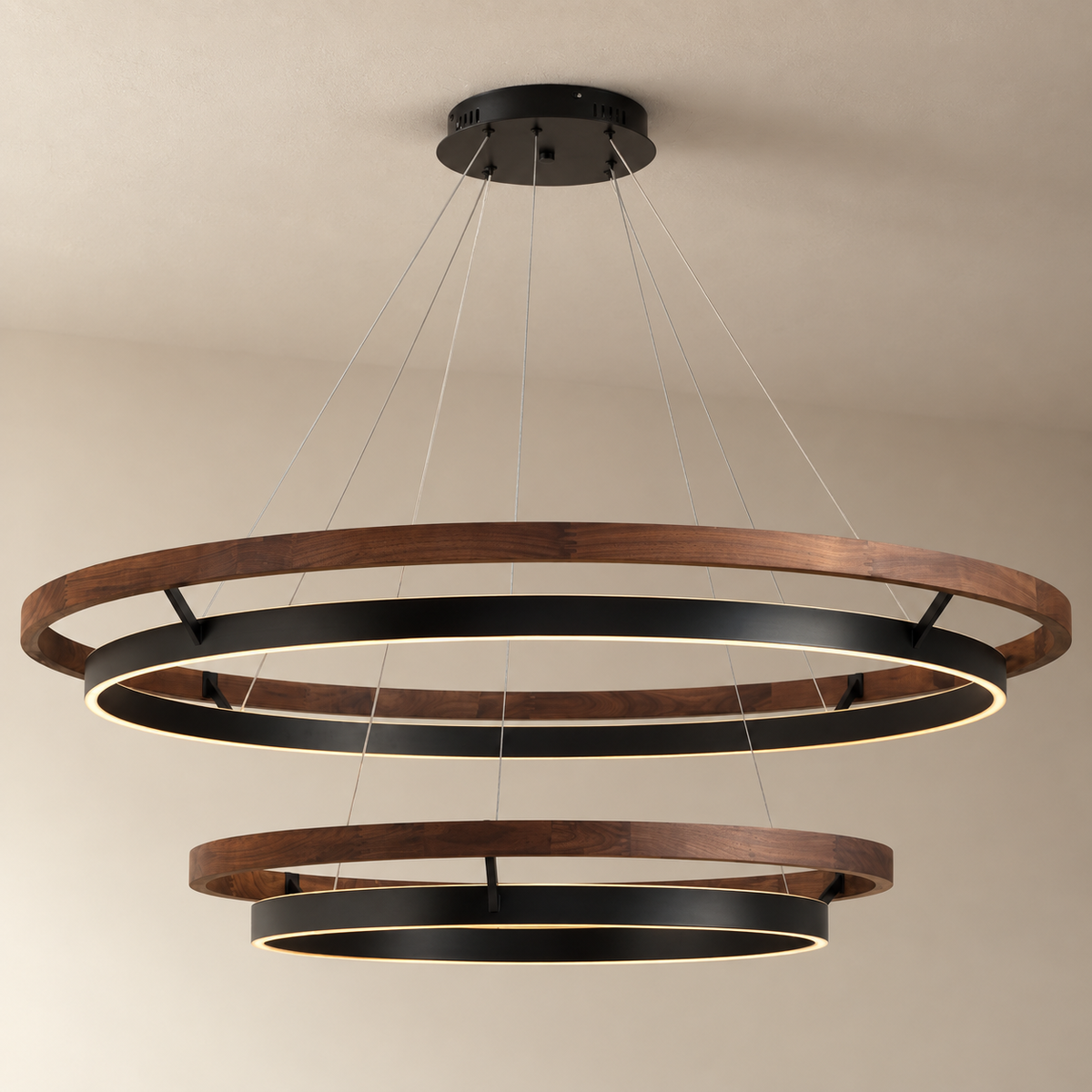 Espargos circular LED ceiling light in walnut, two tiers, 120 and 80 cm, on a plain ceiling.