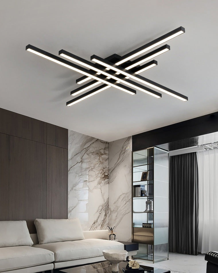 Esposende linear flush mount ceiling light, in a living room, against a marble wall.