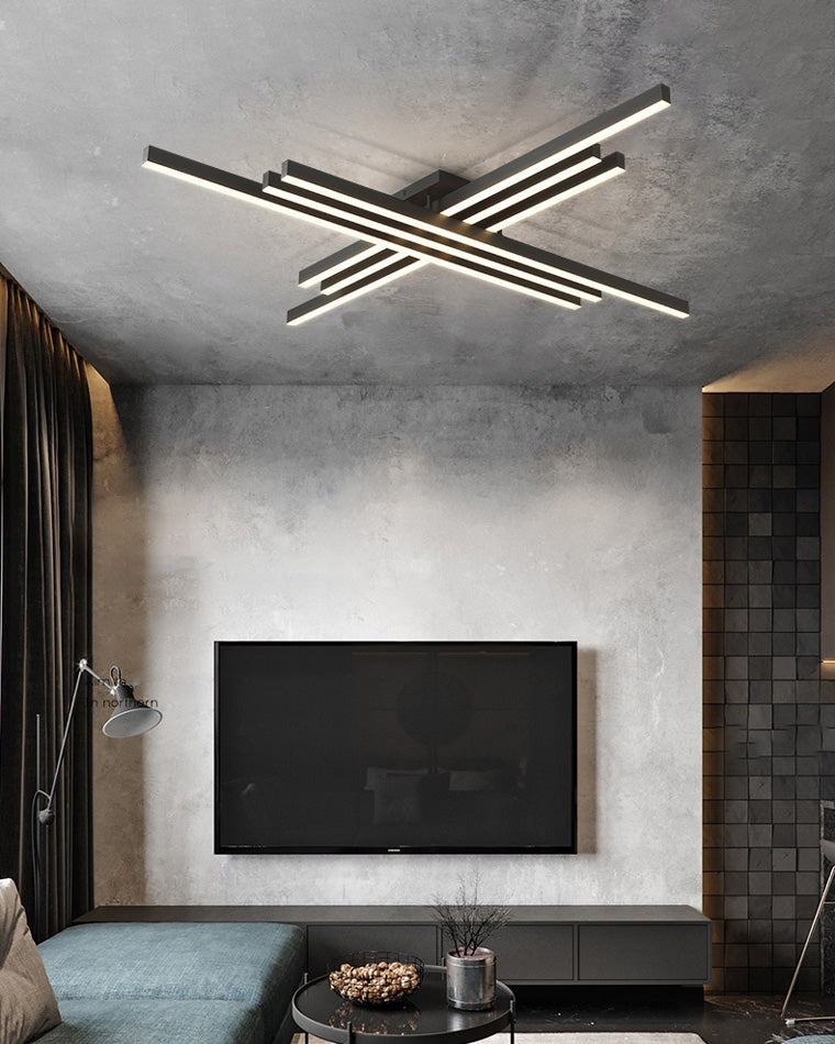 Esposende linear flush mount ceiling light, in a living room, above a fireplace.