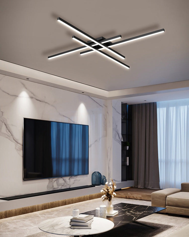 Esposende linear flush mount ceiling light, in a living room, above a low cabinet.