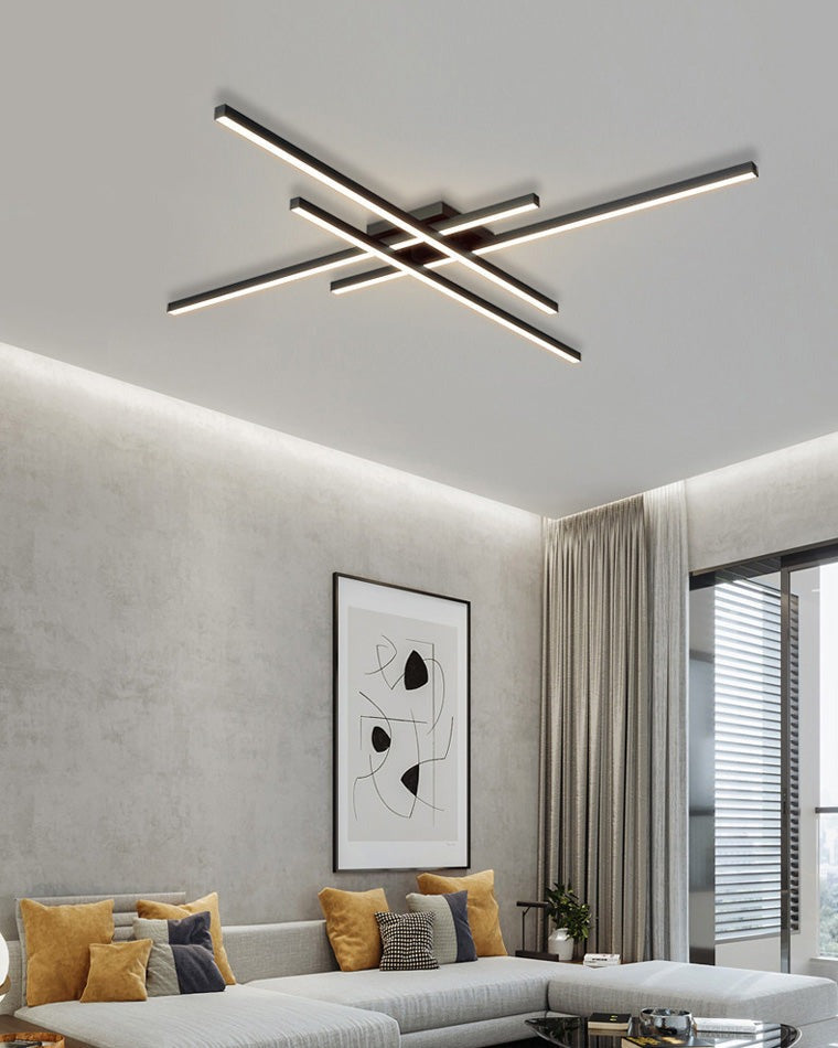 Esposende linear flush mount ceiling light, in a living room, under a skylight.