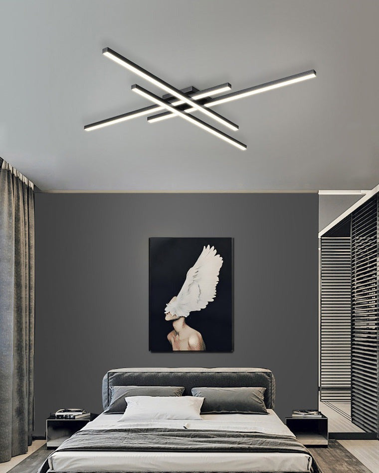 Esposende linear flush mount ceiling light, in a bedroom, above the bed, below framed art.
