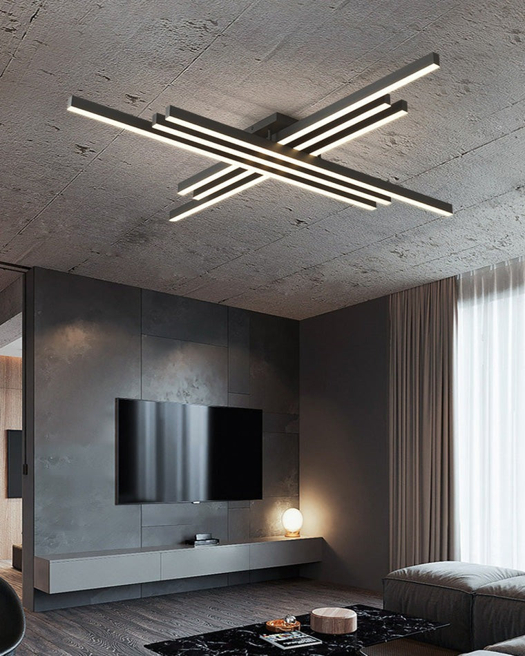 Esposende linear flush mount ceiling light, in a living room, above a wall mounted screen.