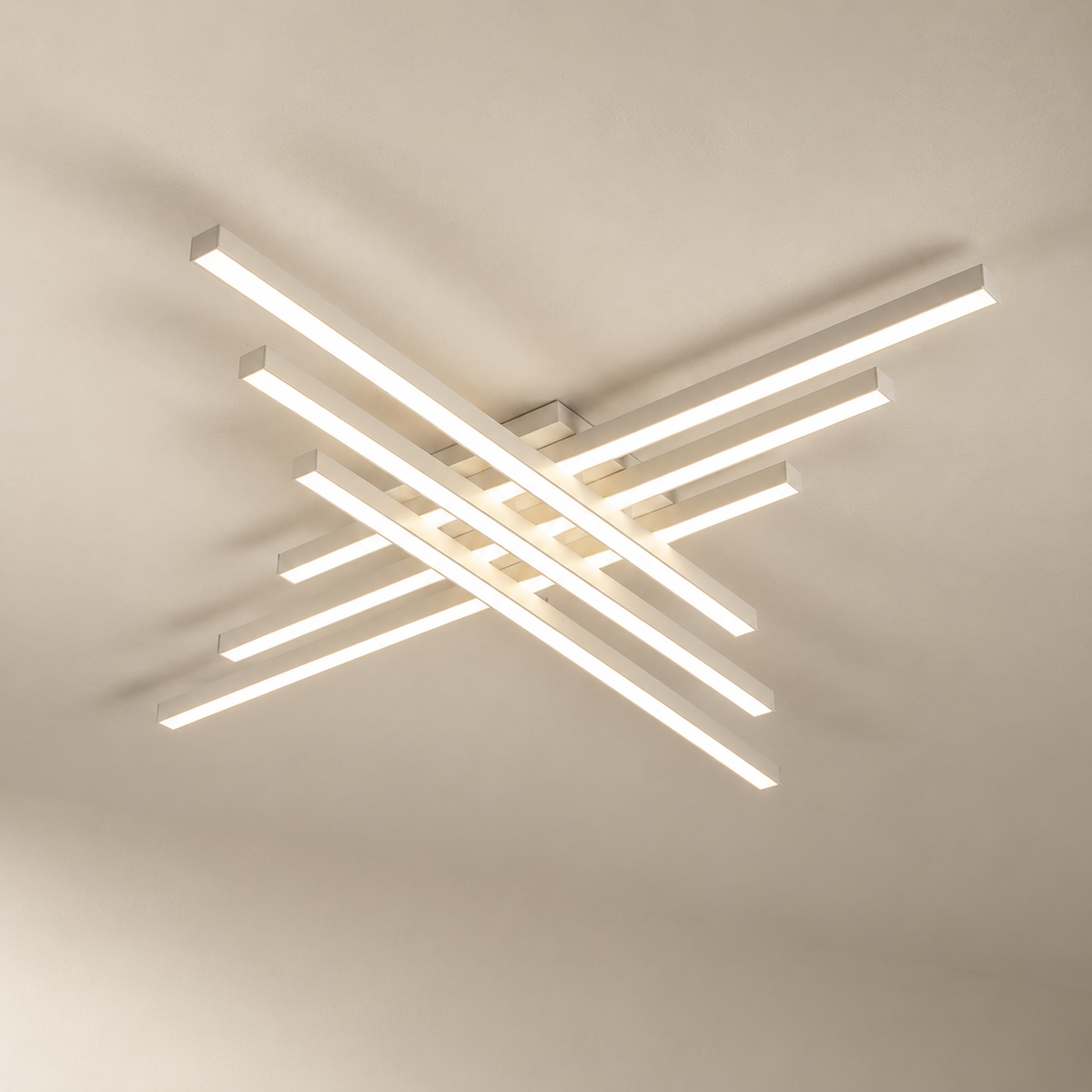 Esposende linear flush mount ceiling light in white, six bar version, on a plain ceiling.