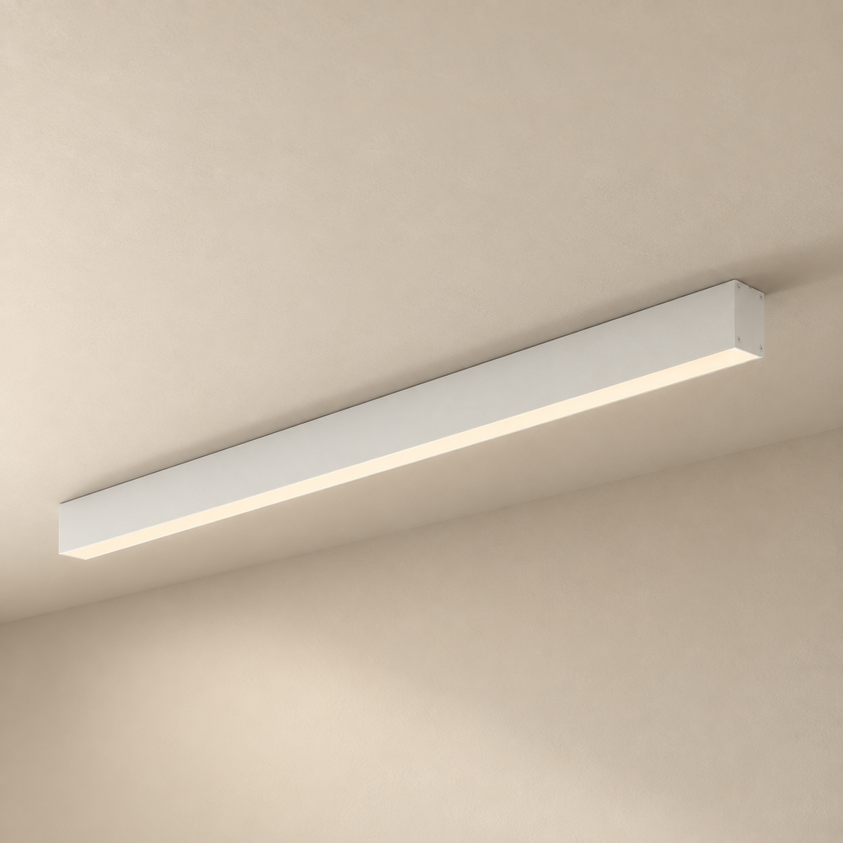 Estarreja linear ceiling light in white, on a plain ceiling.