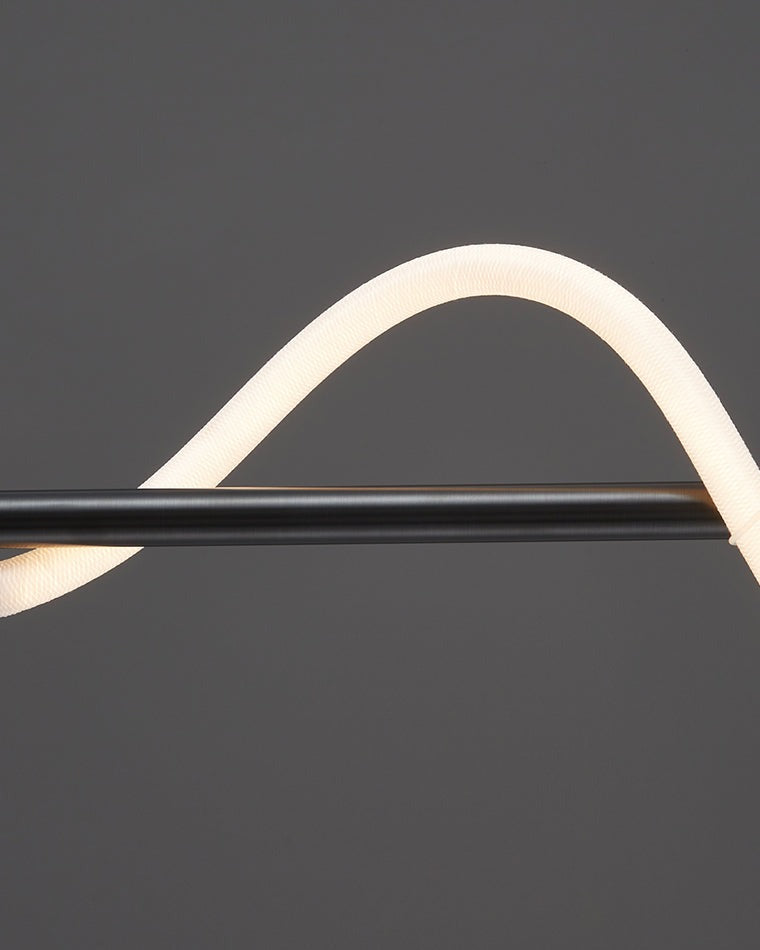 Fátima linear hose pendant light, close detail of the finish and fittings, the hose curving over the bar.