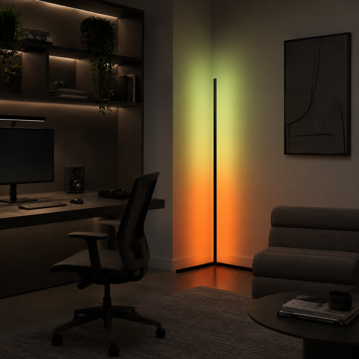 Corner LED floor lamp projecting green and orange light in a home office at night.