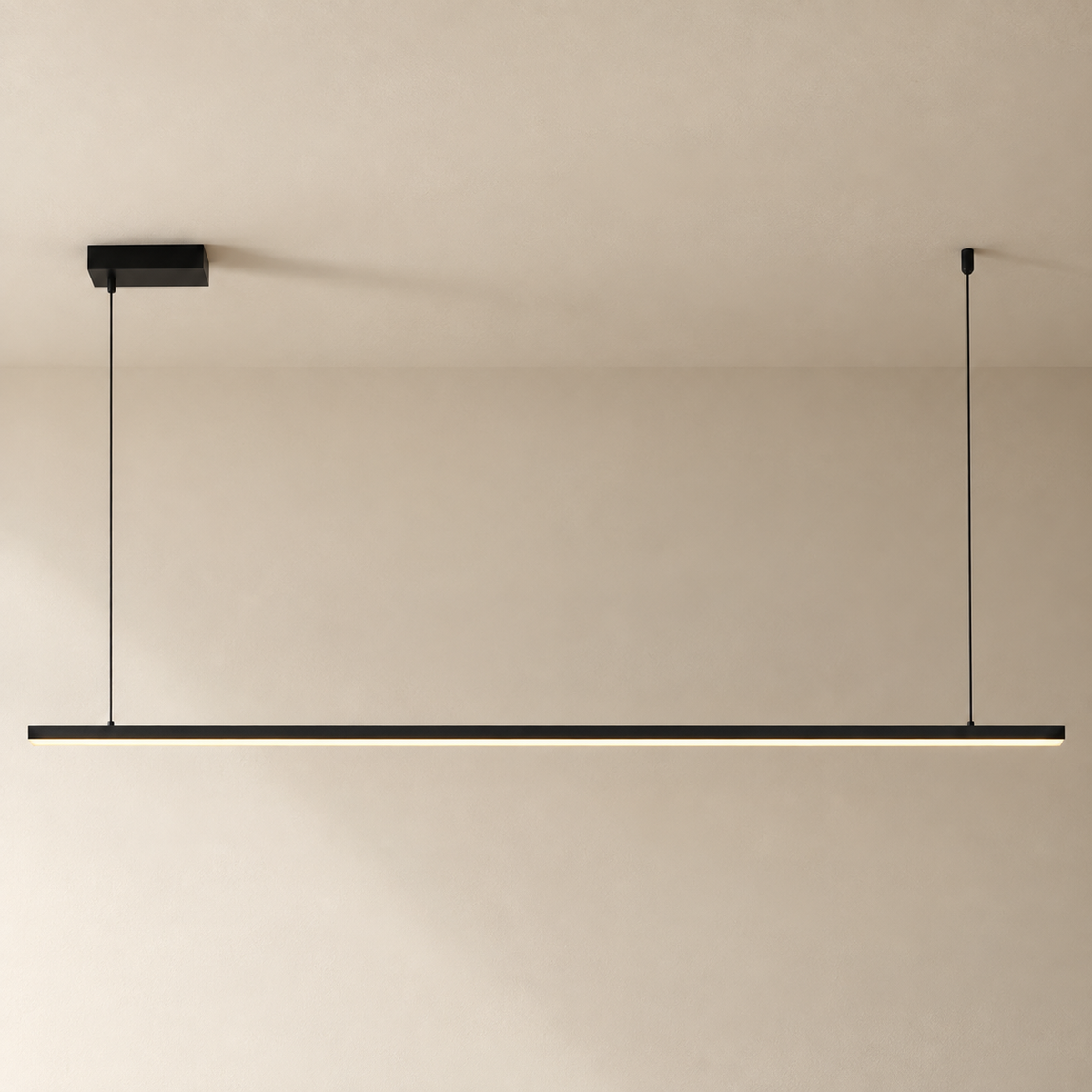 Góis linear LED ceiling light in black, 150 cm length, on a plain ceiling.