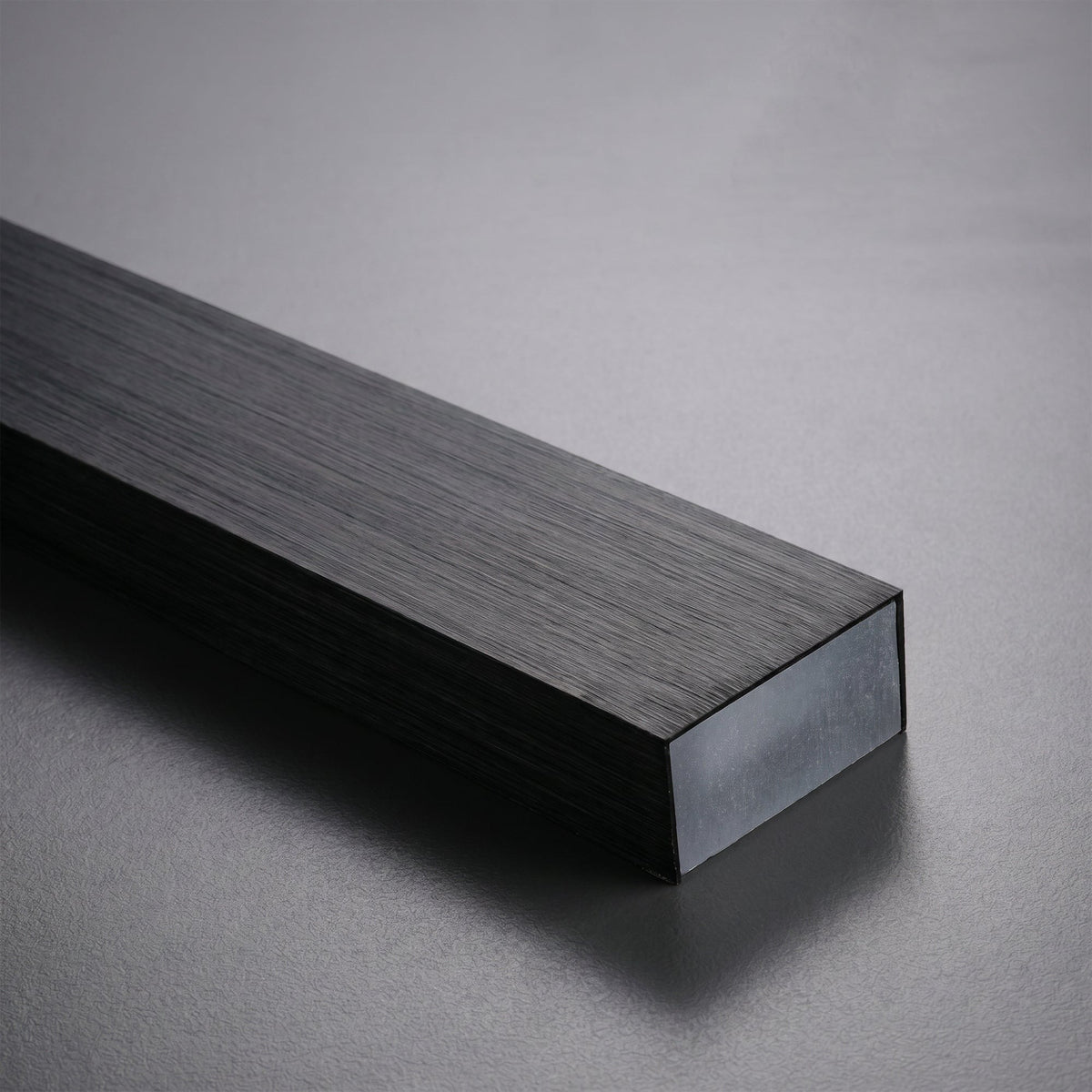 Góis linear LED ceiling light, close detail of the finish and fittings, the wood grain finish.