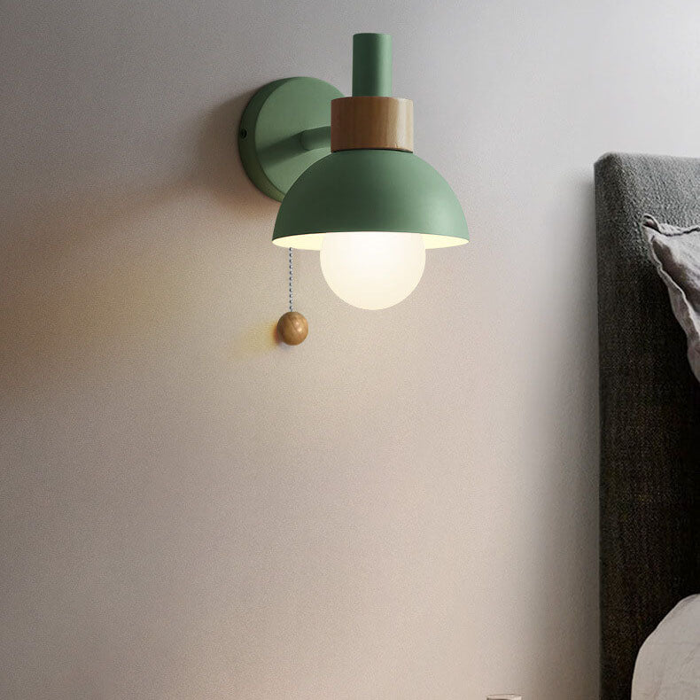 Milfontes. Macaron Glass Wall Sconce studio shot of the glass shade and painted iron backplate together