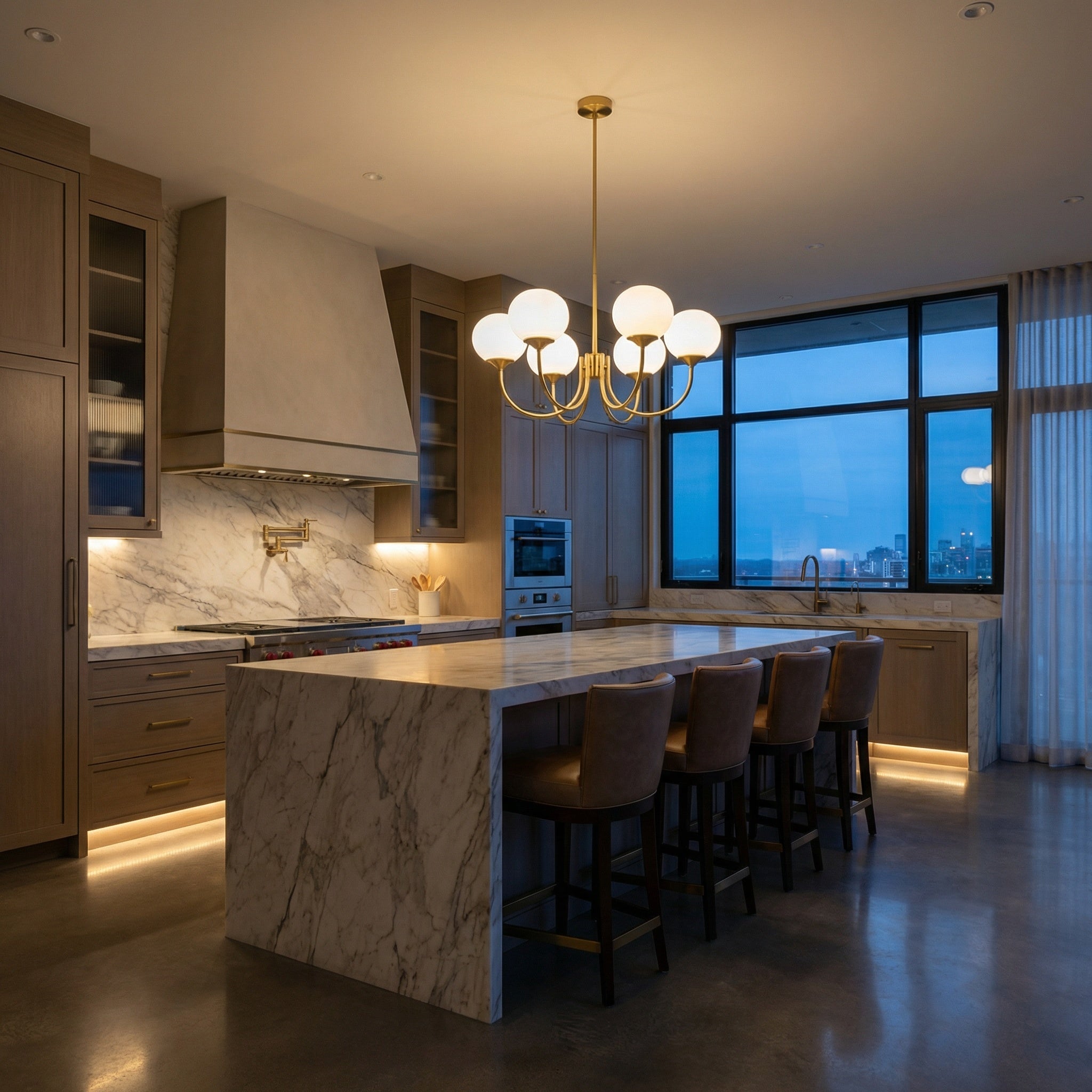 Mindelo Pink Glass Multi-Head Pendant Light over a kitchen island in a bright interior