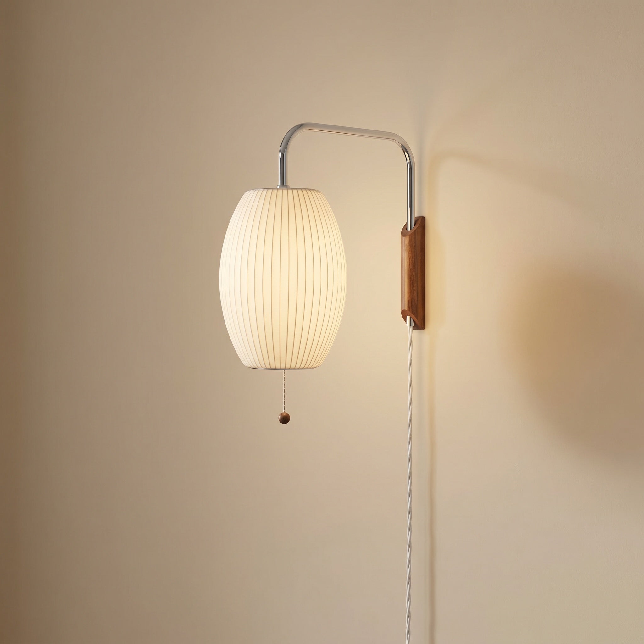 Mirandela globe wall sconce close-up of chrome joint and walnut wood accent