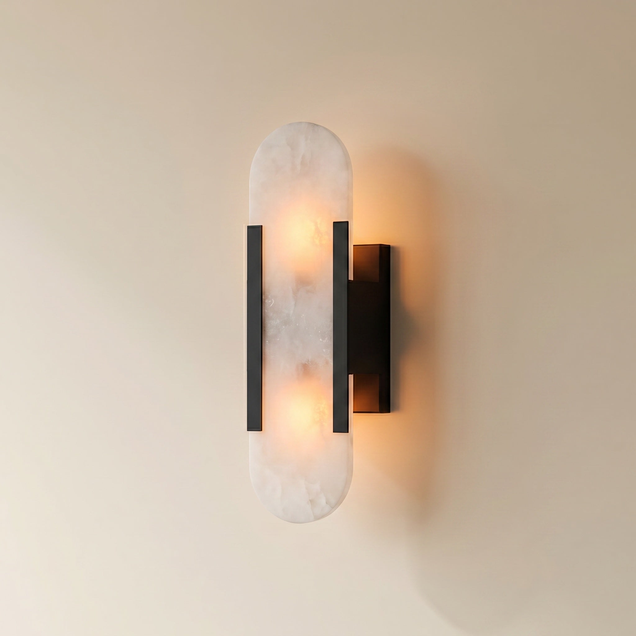 Piódão oblong alabaster wall sconce, hand-cut pill shade on metal frame, front view