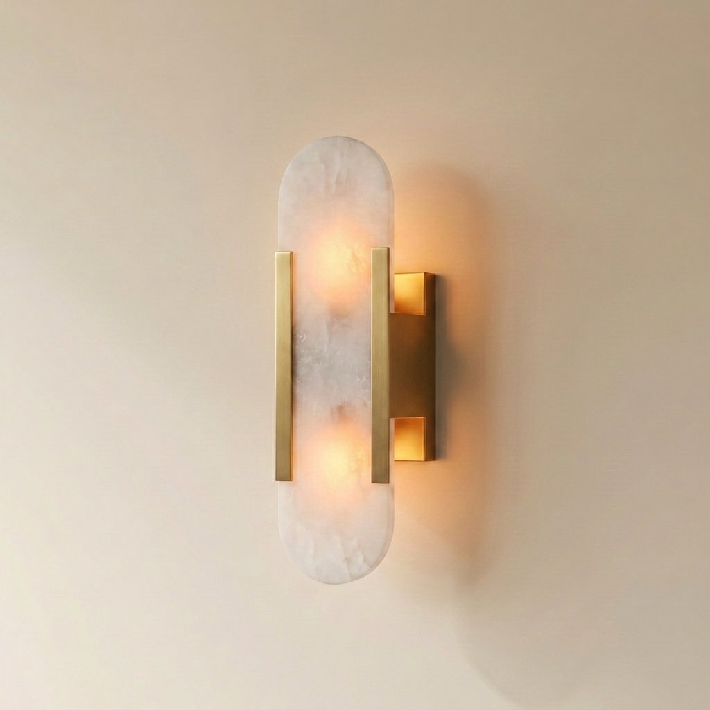 Piódão oblong alabaster wall sconce with brass finish metal arm, angled studio view