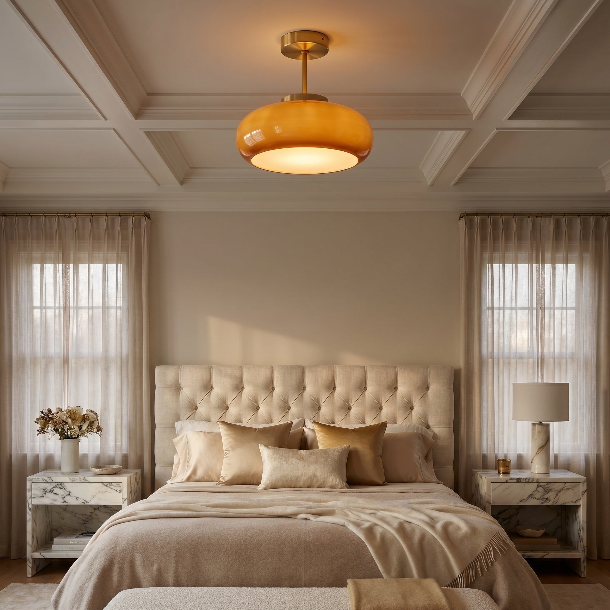 Portalegre brass and yellow glass ceiling light over a wooden dining table