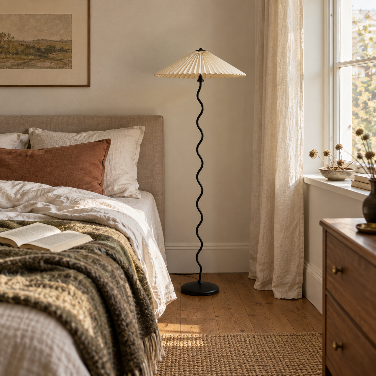 Sintra wavy-stem pleated floor lamp in beige, in a bedroom.
