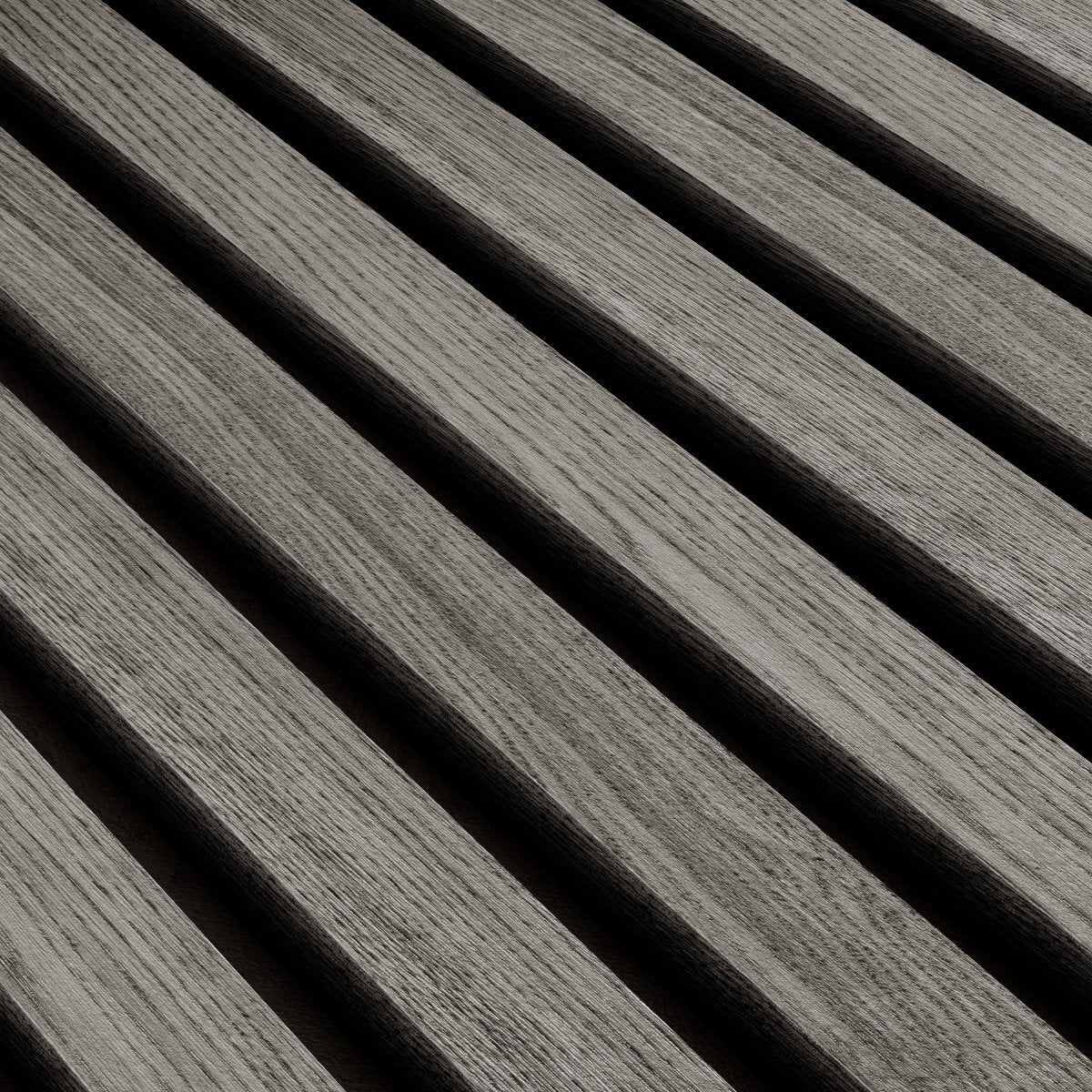 Vela oak slat wall panel in natural grey oak, slat grain close-up.