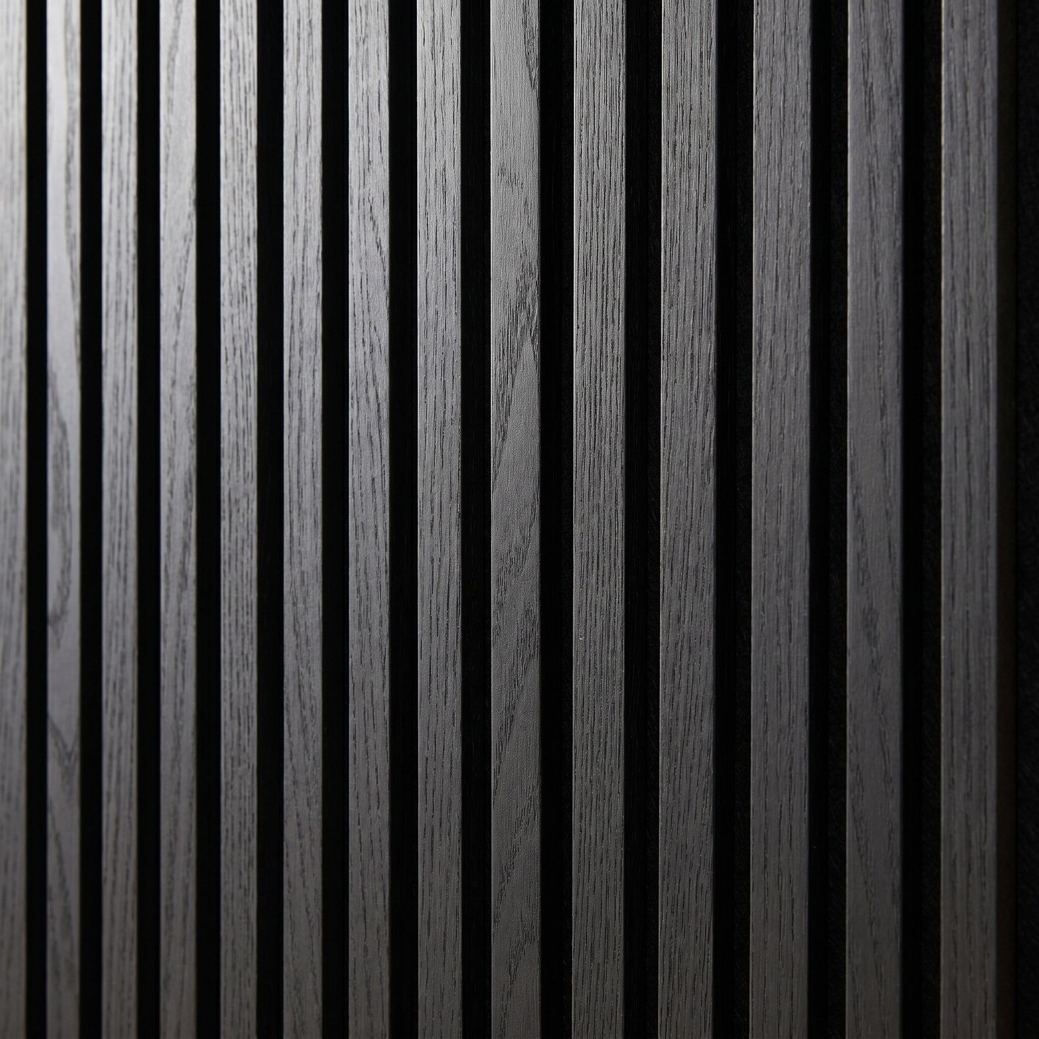 Vela slat panels in a hallway, vertical slats running floor to ceiling.